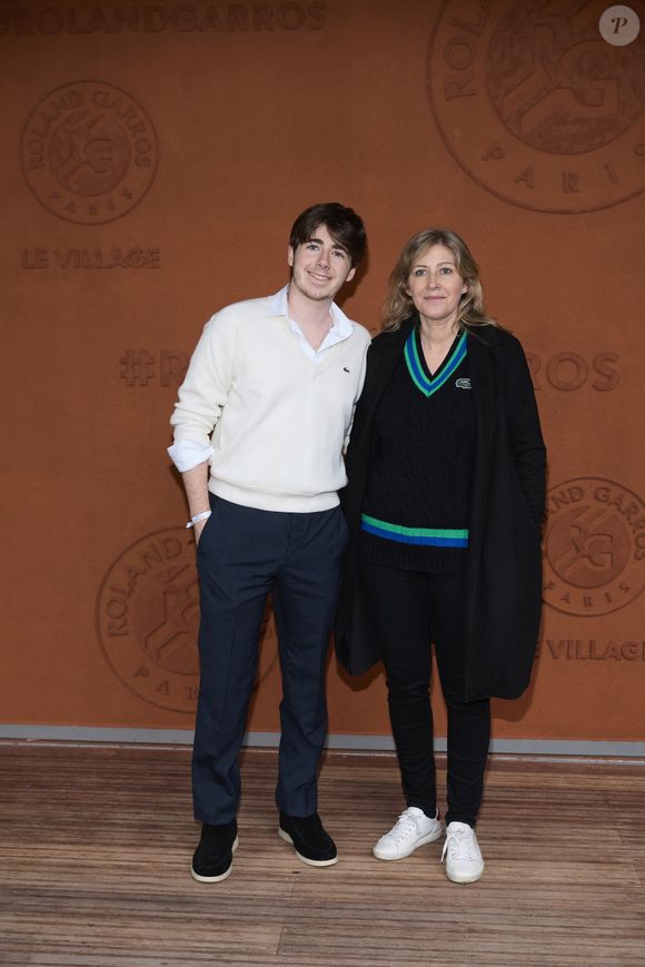 Amanda Sthers et son fils Oscar Bruel au village (night session) lors des Internationaux de France de tennis de Roland Garros 2024, à Paris, France, le 31 mai 2024. © Jacovides-Moreau/Bestimage