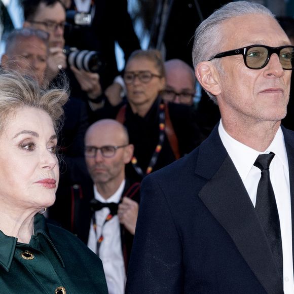 Catherine Deneuve et Vincent Cassel - Montée des marches du film " Histoires parallèles " lors du 79ème Festival International du Film de Cannes, le 14 mai 2026. © Olivier Borde / Bestimage