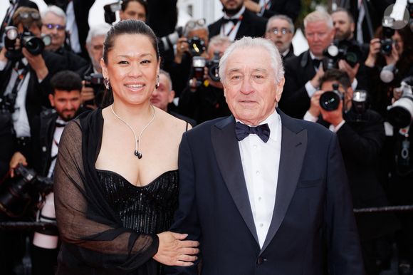 Tiffany Chen et son compagnon Robert de Niro - Montée des marches du film « Partir un jour » pour la cérémonie d’ouverture du 78ème Festival International du Film de Cannes, au Palais des Festivals à Cannes. Le 13 mai 2025
© Jacovides-Moreau / Bestimage