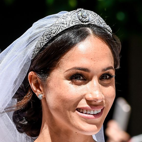 Le prince Harry, duc de Sussex, et Meghan Markle, duchesse de Sussex, en calèche à la sortie du château de Windsor après leur mariage le 19 mai 2018