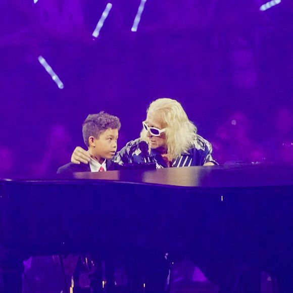Exclusif - Michel Polnareff fête son anniversaire (79 ans) avec son fils Louka sur la scène de l'Accor Arena (Bercy) à Paris le 3 juillet 2023. POUR INFOS VOIR VENDEUR