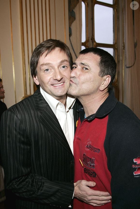 Photo d'archives - Pierre Palmade et Jean-Marie Bigard assistent à la cérémonie organisée au ministère français de la Culture à Paris, France, le 23 mars 2006, en l'honneur de Pierre Palmade recevant le 'Prix Raymond Devos de la langue française'.  Photo par Laurent Zabulon/ABACAPRESS.COM