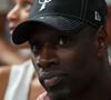 L'annonce a été faite via une publication commune sur leurs comptes Instagram respectifs, ravissant les fans de l'acteur.

Omar Sy - Les célébrités dans les tribunes du match du championnat de France Betclic "Paris - Monaco (92-101)" à Paris, le 23 juin 2026. PsnewZ / Bestimage