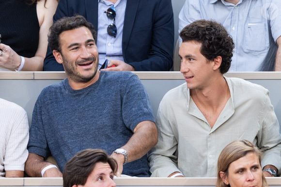 Valentin Kretz et Raphaël Kretz dans les tribunes lors des Internationaux de France de Tennis de Roland Garros 2026. Paris, le 25 mai 2026

© Moreau / Jacovides / Bestimage