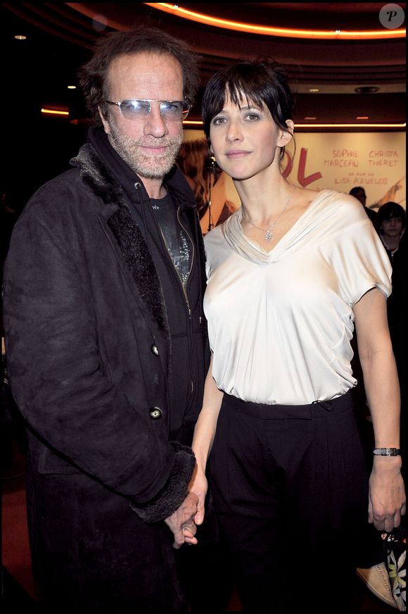 Christophe Lambert et Sophie Marceau - Première du film "Lol" au cinéma Gaumont Marignan à Paris. Coadic Guirec / Bestimage