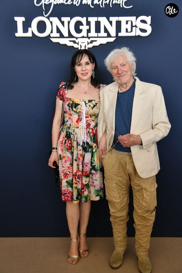 Exclusif - Hugues Aufray et sa femme Murielle dans l’espace VIP “le Pavillon Eiffel,” lors de la 12ème édition Longines Paris Eiffel Jumping au pied de la Tour Eiffel sur le Champ-de-Mars à Paris, France le 20 juin 2026 © Perusseau / Veeren / Bestimage