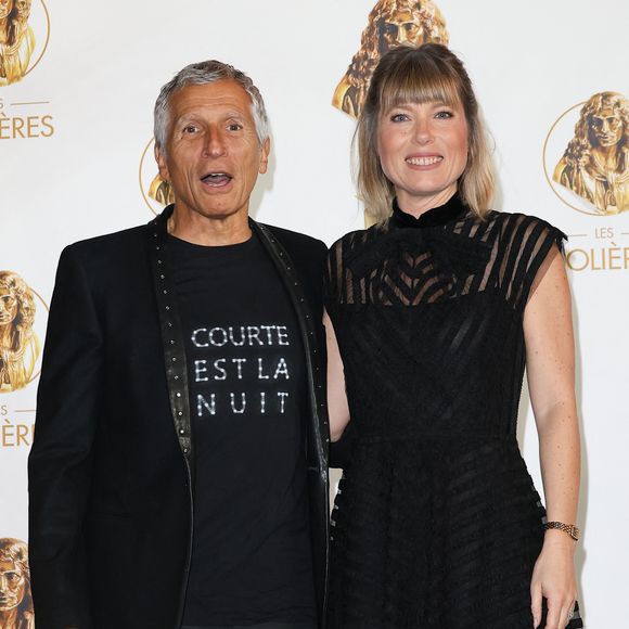 "Il y a des endroits où il (Nagui, ndlr) ne vient pas avec nous comme la plage en France ou des endroits où on se pose, où donc tout le monde peut nous prendre en photos."

Nagui et sa femme Mélanie Page - 35ème cérémonie des Molières aux Folies Bergère à Paris le 6 mai 2024. © Coadic Guirec / Bestimage