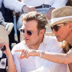 Laurence Ferrari, son mari Renaud Capuçon et leur fils Elliott dans les tribunes  lors des internationaux de tennis de Roland Garros à Paris, France, le 2 juin 2019. © Jacovides-Moreau/Bestimage