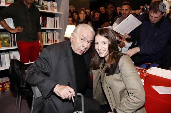 Michel Galabru et sa petite fille Sophie Galabru à la 33eme édition du Salon du Livre de la porte de Versailles a Paris le 24 mars 2013. CEDRIC PERRIN / BESTIMAGE