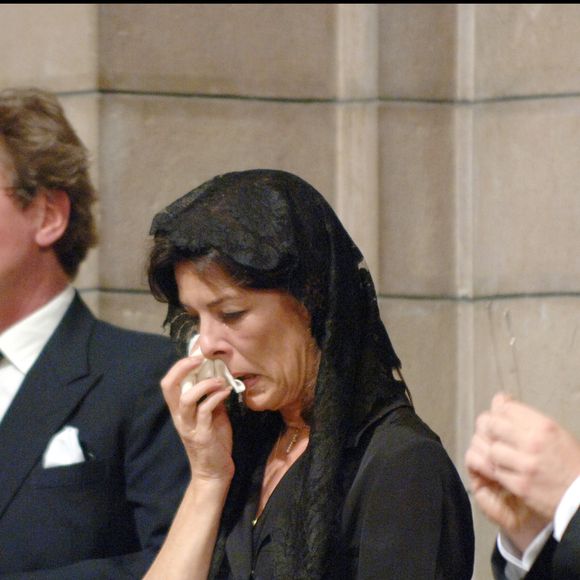 Le prince Albert II de Monaco, la princesse Caroline de Hanovre et le prince Ernst Auguste Hanovre lors de la messe commémorative du premier anniversaire de la mort de la Prince Rainier de Monaco, en 2006. POOL / BESTIMAGE