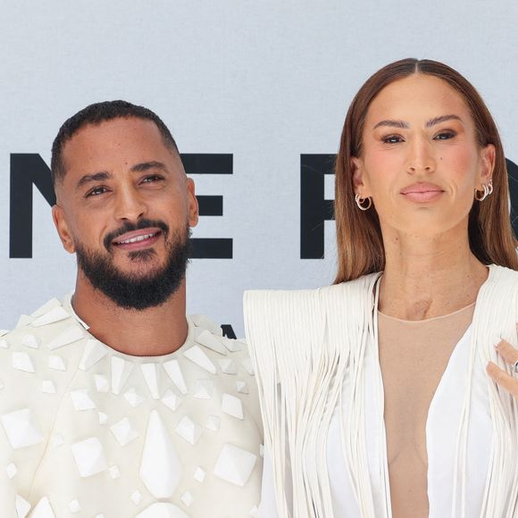 Cette transformation a lieu alors que l'ami de Vitaa a vécu des tourmentes, 

Slimane Nebchi et Charlotte Gonin (Vitaa). au photocall du défilé Stéphane Rolland Collection Haute Couture Automne/Hiver 2025-2026 lors de la Fashion Week de Paris (PFW) au théâtre des Champs-Élysées, à Paris, France, le 8 juillet 2025. © Sebastien Fremont/Bestimage