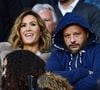 À 42 ans, la chanteuse affiche une silhouette des plus toniques et semble bien avoir levé le voile sur le secret de sa ligne sculptée.

Vitaa et son mari Hicham Bendaoud dans les tribunes du match de Ligue 1 Conforama  PSG 5-0 Montpellier au Parc des Princes à Paris le 1 février 2020
© Giancarlo Gorassini / Bestimage