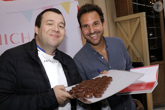 Christophe Michalak et le Chef Guillaume Gomez - Sortie du Livre de Christophe Michalak "la Patisserie en Famille" à Paris le 9 octobre 2019. 

© Cédric Perrin/Bestimage