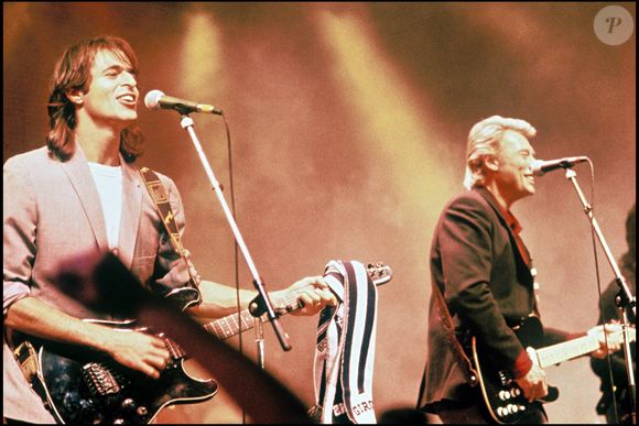 (archive) Jean-Jacques Goldman et Johnny Hallyday sur scène.
©AGENCE / BESTIMAGE