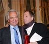 et ils sont restés proches depuis, partageant l'amour du cinéma mais aussi celui de la littérature.
Philippe Labro et Fabrice Luchini au ministère de la culture en 2002
©RINDOFF-GUIREC / BESTIMAGE