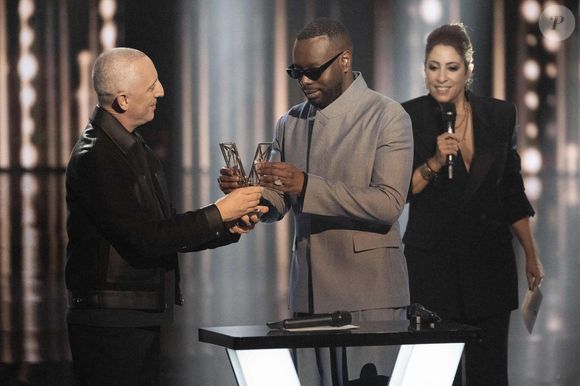 Maitre Gims reçoit un prix d'honneur de Gad Elmaleh lors des 40èmes Victoires De La Musique à La Seine Musicale le 14 février 2025 à Boulogne-Billancourt, France. Photo by David NIVIERE/ABACAPRESS.COM