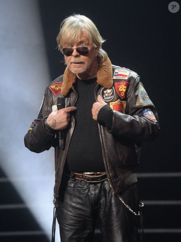 Malone est né de la relation entre Romane Serda et le chanteur Renaud.

Le chanteur Renaud (Renaud Séchan) - Grand Prix Sacem à la salle Pleyel à Paris présenté par V. Dedienne. © Veeren/Bestimage