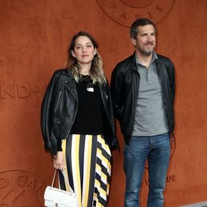 Guillaume Canet et Marion Cotillard -   People au village pour la finale hommes lors des internationaux de France de tennis de Roland Garros 2019 à Paris le 9 juin 2019.
© Jacovides - Moreau / Bestimage