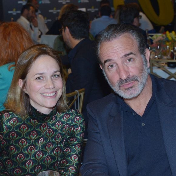 Jean Dujardin et sa femme Nathalie Péchalat (nouvelle présidente de l'association "Premiers de Cordée") - Dîner de charité Breitling à la Samaritaine pour l'association "Premiers de Cordée" à Paris le 4 avril 2024. Rachid Bellak/Bestimage