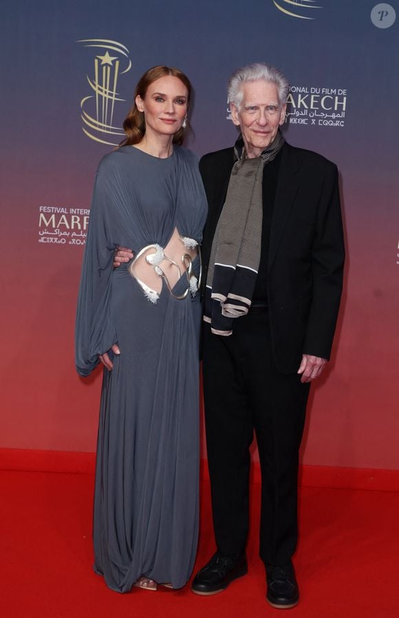 C'est la comédienne qui s'est chargée de remettre un prix d'honneur au réalisateur et producteur canadien David Cronenberg, ému par cette belle distinction.
Diane Kruger, David Cronenberg - Tapis rouge du 21ème Festival du film de Marrakech au Maroc le 2 Décembre 2024. © Dominique Jacovides/Bestimage