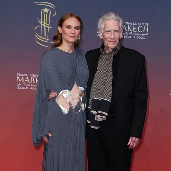 C'est la comédienne qui s'est chargée de remettre un prix d'honneur au réalisateur et producteur canadien David Cronenberg, ému par cette belle distinction.
Diane Kruger, David Cronenberg - Tapis rouge du 21ème Festival du film de Marrakech au Maroc le 2 Décembre 2024. © Dominique Jacovides/Bestimage
