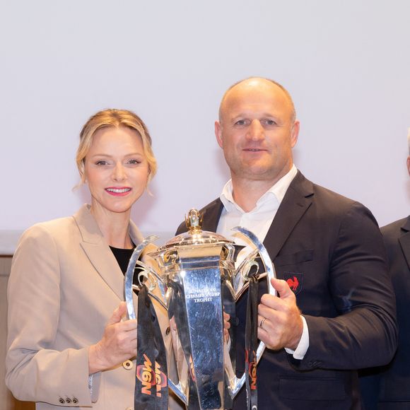 La princesse Charlène de Monaco avec William Servat, l'entraîneur du XV de France - La princesse C.de Monaco, en compagnie de son frère G.Wittstock, participe à la remise des prix de la "Journée du respect" au collège Charles III à Monaco, le 29 avril 2025. © Olivier Huitel / Pool Monaco / Bestimage