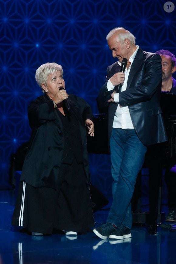 Exclusif - Mimie Mathy, Michel Fugain - Surprises - Enregistrement de l'émission "La Boîte à Secrets N°19" dans les studios de la Cité du Cinéma à Saint-Denis, présentée par F.Bollaert et diffusée le 3 janvier sur France 3
© Christophe Clovis / Bestimage