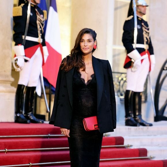 Tatiana Silva (enceinte, ancienne miss Belgique) arrivant au dîner d'état au palais de l'Elysée à Paris en l'honneur de la visite du roi et de la reine de Belgique en France le 14 octobre 2024.

© Dominique Jacovides / Bestimage