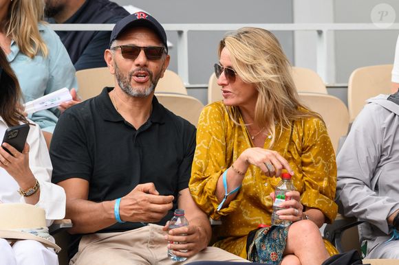 Roschdy Zem et Sarah Poniatowski, dans les tribunes de Roland Garros