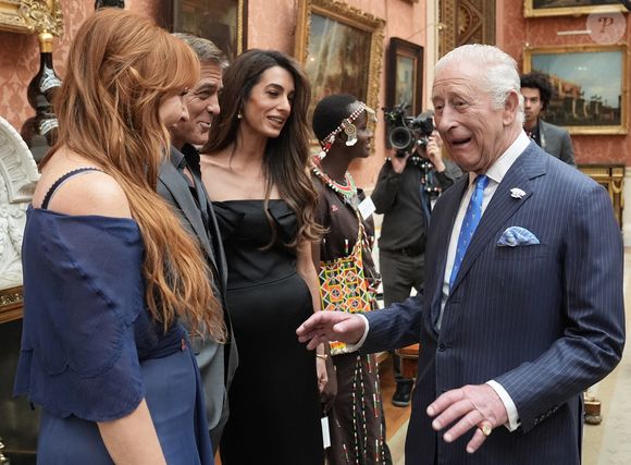 George et Amal Clooney avec le roi Charles lors de la réception en l'honneur des lauréats des King's Trust Awards au palais de Buckingham le 25 juin 2025  Stefan Rousseau/WPA-Pool/Bestimage