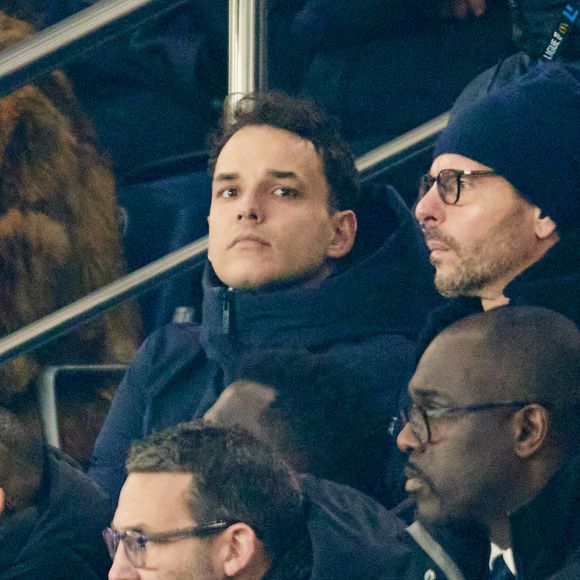 Théo Curin en tribune lors du match de football en ligue 1 McDonald Paris-SG contre Saint-Etienne au Parc des Princes le 12 janvier 2025. Le Paris SG remporte le match 2 - 1.