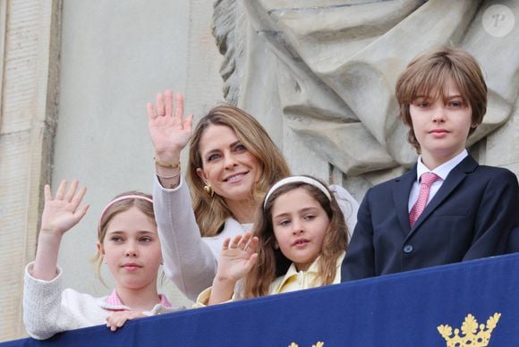 La princesse Madeleine de Suède, la princesse Leonore de Suède, Prince Nicolas,  Princess Adrienne lors d'une parade militaire et en faisant une apparition au balcon du palais royal de Stockholm avec sa famille le 30 avril 2025.  © Dana Press/Bestimage