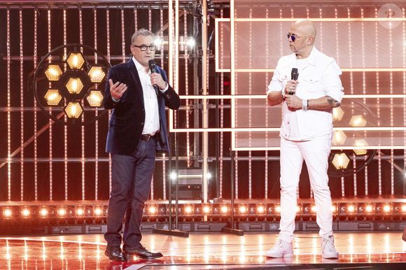 Exclusif - Christophe Dechavanne et Pascal Obispo lors de l'enregistrement de la soirée "Les 30 ans du sidaction - la soirée événement" au Grand Rex à Paris diffusée le 23 mars 2024 sur France 2

© Cyril Moreau / Coadic Guirec / Bestimage