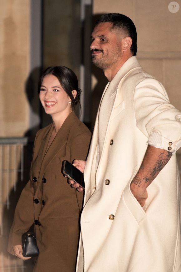 Florent Manaudou et Elsa Bois au défilé AMI "Collection Homme Prêt-à-Porter Automne/Hiver 2026-2027" lors de la Fashion Week de Paris (PFW) le 21 janvier 2026.

© Florian Lavielle / Bestimage