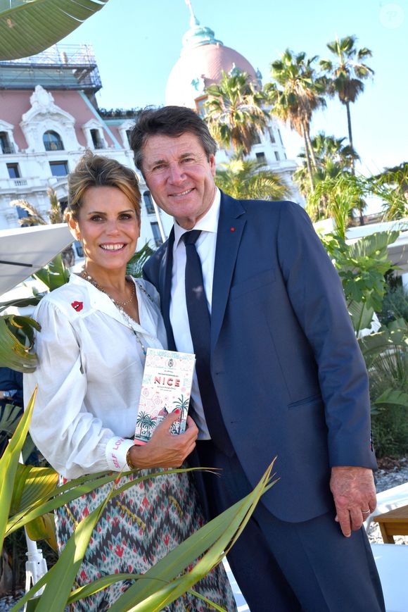 Exclusif - Laura Tenoudji Estrosi et son mari Christian Estrosi, le maire de Nice - Laura Tenoudji Estrosi a présenté son troisème guide des adresses incontournables de Nice sur la nouvelle Plage du Negresco à Nice, le 24 juin 2022.  © Bruno Bebert/Bestimage
