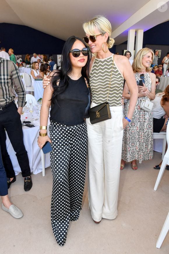 Exclusif -  Laeticia Hallyday et sa fille Joy dans l'Espace VIP lors de la 9ème édition du "Longines Paris Eiffel Jumping" au Champ de Mars à Paris, France, le 25 juin 2023. © Perusseau-Veeren/Bestimage