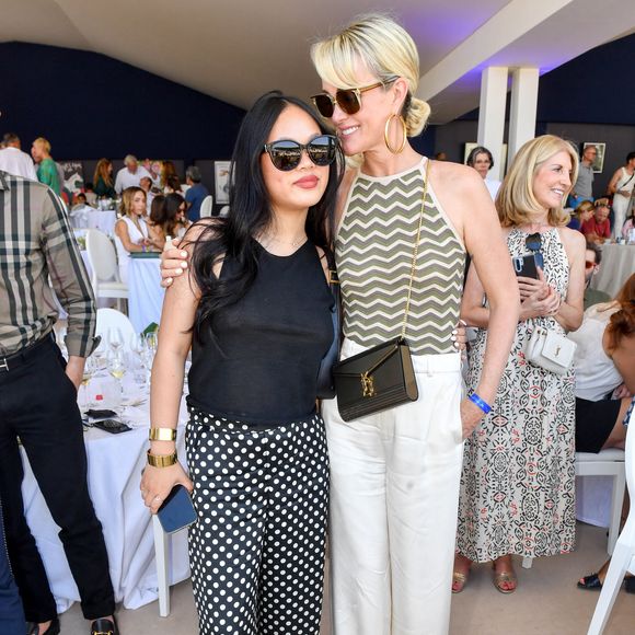 Exclusif -  Laeticia Hallyday et sa fille Joy dans l'Espace VIP lors de la 9ème édition du "Longines Paris Eiffel Jumping" au Champ de Mars à Paris, France, le 25 juin 2023. © Perusseau-Veeren/Bestimage