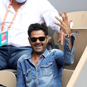 Il y a quelques années, Jamel Debbouze avait perturbé une finale de tournoi à Roland-Garros à tel point que l'arbitre s'est demandé s'il n'allait pas être nécéssaire de le sortir des tribunes

Jamel Debbouze fait le show dans les tribunes des internationaux de France Roland Garros à Paris. © Dominique Jacovides / Bestimage