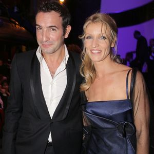 Jean Dujardin et Alexandra Lamy lors de la 32ème cérémonie des César qui s'est tenue au Théâtre du Chatelet à Paris, France, le 24 février 2007. Photo by Guignebourg-Nebinger/ABACAPRESS.COM