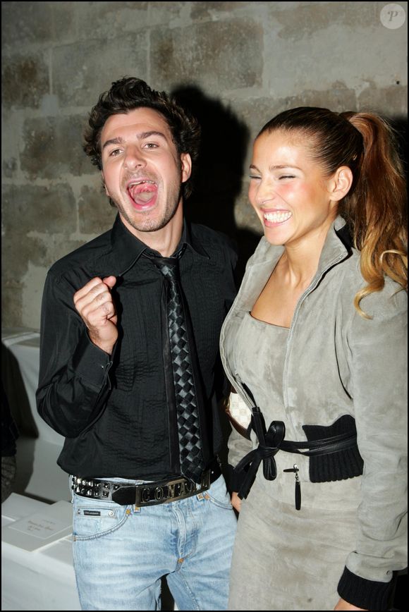Michael Youn et Elsa Pataky - People - Défilé de mode Loew collection pret à porter printemps été 2005 à Paris.
RINDOFF-BORDE / BESTIMAGE