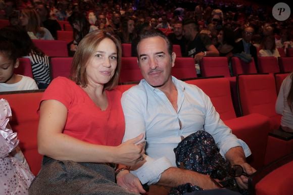 Exclusif - Nathalie Pechalat et son mari Jean Dujardin - People à la représentation exceptionnelle du spectacle musical "Sur la route Enchantée" de Chantal Goya au Palais des Congrès de la Porte Maillot à Paris - © Jack Tribeca / Bestimage