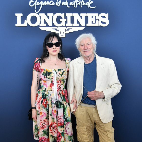 Hugues Aufray et sa femme Murielle dans l’espace VIP “le Pavillon Eiffel,” lors de la 12ème édition Longines Paris Eiffel Jumping au pied de la Tour Eiffel sur le Champ-de-Mars à Paris, France le 20 juin 2026

© Perusseau / Veeren / Bestimage