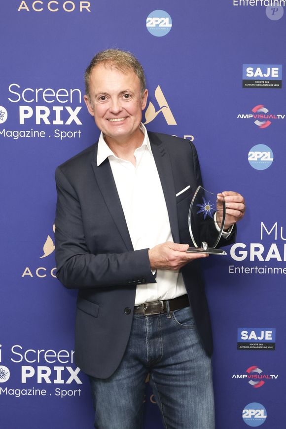 Exclusif - Éric Besnard Présentateur du Multiplex Ligne des Champions Canal+ - Première édition du Multi Screen Grand Prix : une célébration inédite de la création audiovisuelle française dans le cadre prestigieux du Pullman Paris Tour Eiffel sous la présidence de S. Martin (Directeur Général de l'ARPP : l'Autorité de Régulation Professionnelle de la Publicité et également Président de La Fabrique des Formats) et animée par E. Eméyé (journaliste et présentatrice).
Cet événement a rassemblé les professionnels de l'audiovisuel autour d'une ambition commune : mettre à l'honneur l'excellence de la création française tous formats confondus. Paris le 12 juin 2025 - © Jack Tribeca / Bestimage