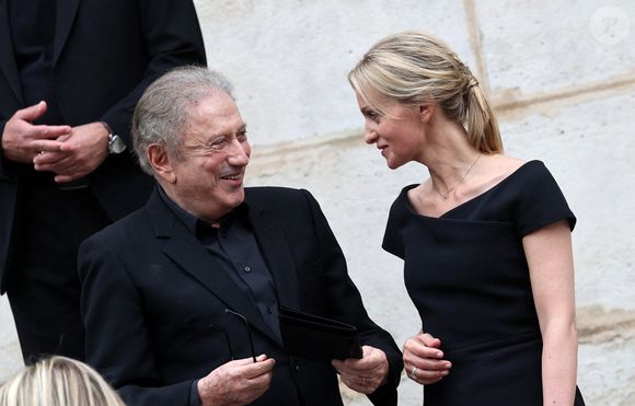 Michel Drucker, Audrey Crespo-Mara - Sorties des obsèques de Thierry Ardisson en l’église Saint-Roch de Paris, France, le 17 juillet 2025. 

© Clovis-Jacovides/Bestimage