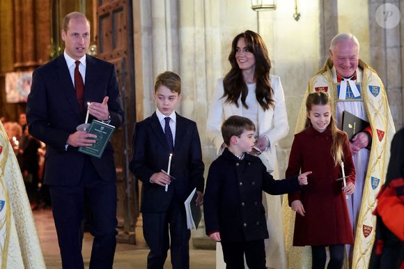 Le prince William de Galles, Kate Catherine Middleton, princesse de Galles et leurs enfants, le prince George, la princesse Charlotte et le prince Louis lors du traditionnel concert de Noël "Together At Christmas" en l'abbaye de Westminster à Londres. Photo par PA Photo/ Bestimage