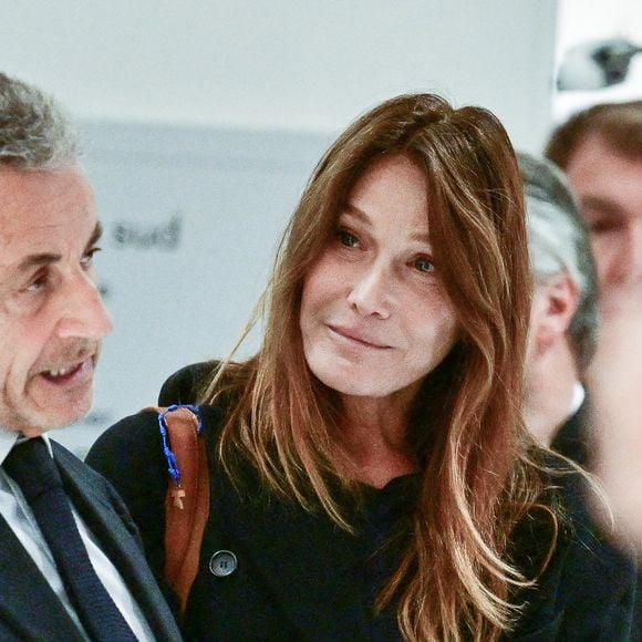 Nicolas Sarkozy et sa femme Carla Bruni - Nicolas Sarkozy condamné à 5 ans de prison à l'issue du procès de l'affaire du financement libyen au tribunal correctionnel de Paris, le 25 septembre 2025. L'ancien chef de l'Etat était accompagné de sa femme, C.Bruni. Nicolas Sarkozy, jugé coupable d’association de malfaiteurs, sera prochainement convoqué en vue de lui signifier la date de son incarcération. 
© Christian Liewig / Bestimage