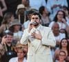 Alors que près de 80 000 personnes avaient fait le déplacement, un orage accompagné de grêle s'est abattu sur le site en plein air. 

Bad Bunny (Benito Antonio Martinez Ocasio) à son concert de Milan juillet 2026 (Crédit Image : © Mirko Fava/IPA via ZUMA Press)