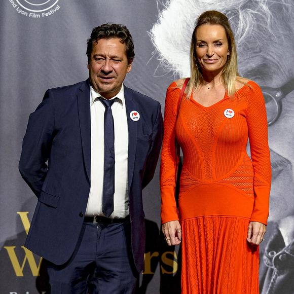 Laurent Gerra et Christelle Bardet - Photocall de la cérémonie de remise du Prix Lumière à W.Wenders à l'occasion de la 15ème Edition du Festival Lumière de Lyon. Le 20 octobre 2023
© Sandrine Thesillat / Panoramic / Bestimage