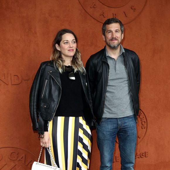 Guillaume Canet et Marion Cotillard - People au village pour la finale hommes lors des internationaux de France de tennis de Roland Garros 2019 à Paris le 9 juin 2019.
© Jacovides - Moreau / Bestimage