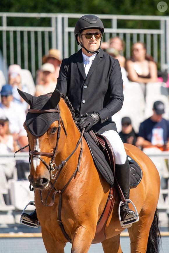 Guillaume Canet sur James Bond du Bec lors du prix Geberit lors de la 9ème édition du "Longines Paris Eiffel Jumping" au Champ de Mars à Paris, France, le 24 juin 2023. © 
Perusseau-Veeren/Bestimage